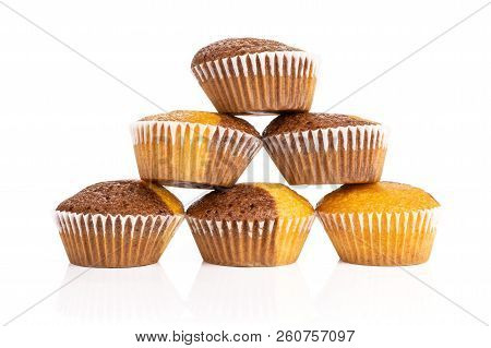 Set Of Six Whole Fresh Baked Marble Muffin Isolated On White Background