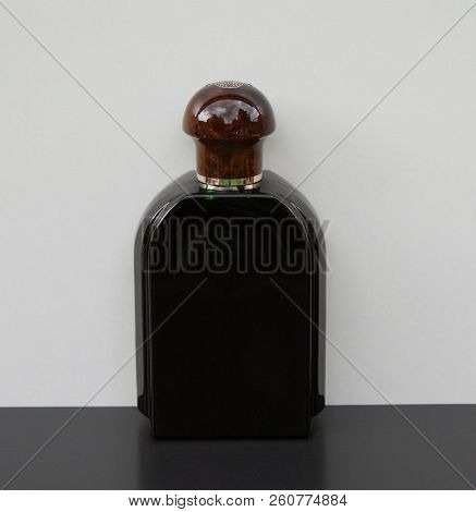 Eau De Toilette, Large Perfume Bottle In Front Of A White Background