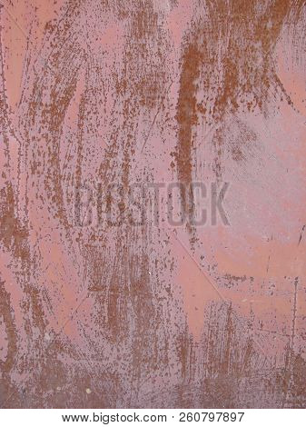 The Background Is A Textured Sheet Metal With Paint And Rust