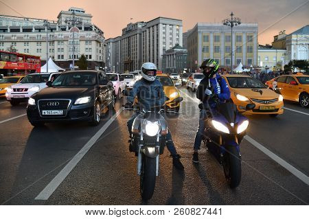 Moscow, Russia - September 22. 2018. Motorcyclists And Traffic On Teatralny Proezd One Of Main Stree