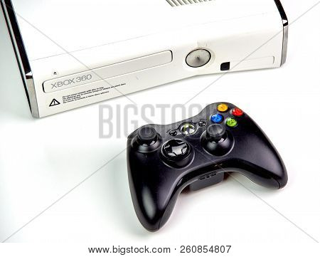 Montreal, Canada - September 8, 2018: Xbox 360 Video Gaming Console With A Controller On A Table. Th