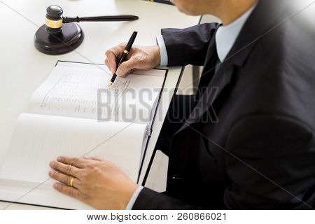 Gavel And Sound Block Of Justice Law And Lawyer Working On Wooden Desk Background