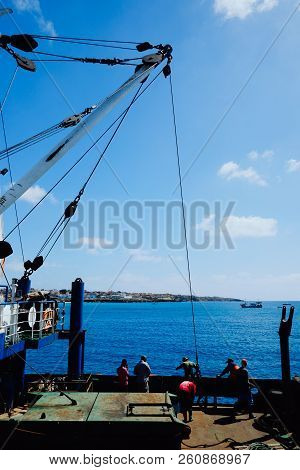 Vila Do Maio ,maio Island, Cape Verde - Jan 5 2016: Sailors Waiting To Off Load The Goods In The Bea