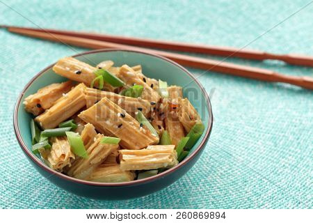 Chinese and Korean yuba salad with green onion and sesame seeds
