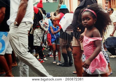 Mindelo, Sao Vicente Island, Cape Verde - Jan 5 2016: Carnival Crowd Walking On The Streets Of The C