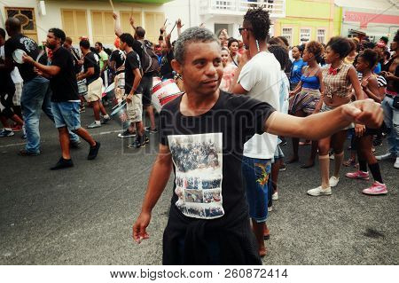 Mindelo, Sao Vicente Island, Cape Verde - Jan 5 2016: Carnival Crowd Walking On The Streets Of The C