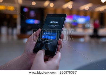 Chiang Mai, Thailand - August 03,2018: Woman Holding Huawei With Vimeo On Screen.  Vimeo Is A Video-