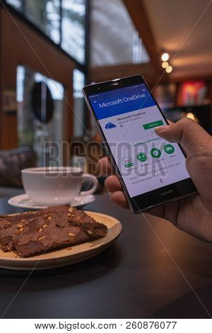 Chiang Mai, Thailand - May 09,2018: Man Holding Huawei With Onedrive On Screen. Microsoft Onedrive I