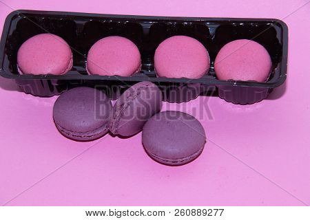 Macaroni On A Gently Pink Background. Delicious Cakes For Tea. Dessert Close-up.
