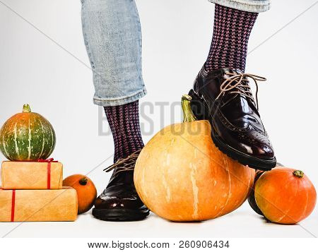 Beautiful Pumpkins And Men's Legs In Stylish Shoes