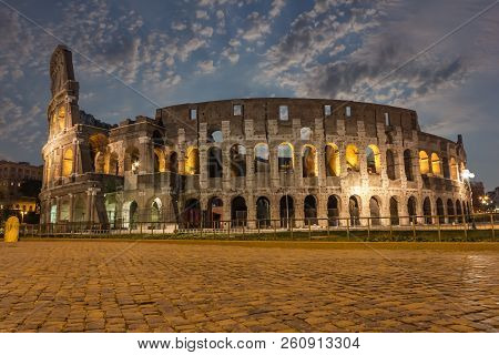 The Coliseum In The Clouds In Twilight