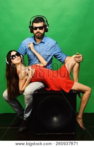 Relax And Melomania Concept. Man With Beard Wears Headphones