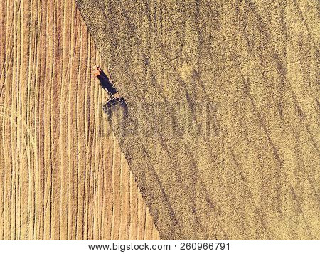 Tractor Working In The Fields, Aerial View, Hay On The Field. The View From The Top. Tractor Harvest