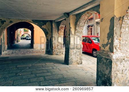 Chioggia, Italy-august 26, 2018: Province Of Venice. Street With An Arch And Columns.