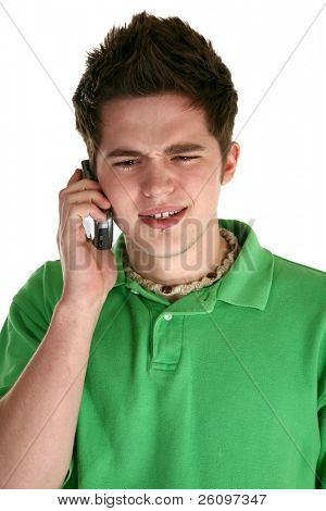 Attractive eighteen year old male with cellphone over white.