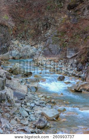 Natural Fresh Blue River From On-sen Or Hot Spring At Yudanaka Nagano Japan.