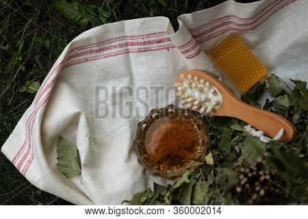 Bath Soap Lies On A Light Towel. A Birch Broom, A Body Brush And Natural Honey Lie Nearby. Set Of Ac