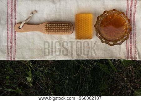 Bath Soap Lies On A Light Towel. A Birch Broom, A Body Brush And Natural Honey Lie Nearby. Set Of Ac