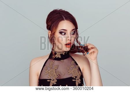 Unhappy Frustrated Young Woman Surprised She Is Losing Hair, Receding Hairline. Gray Background. Hum