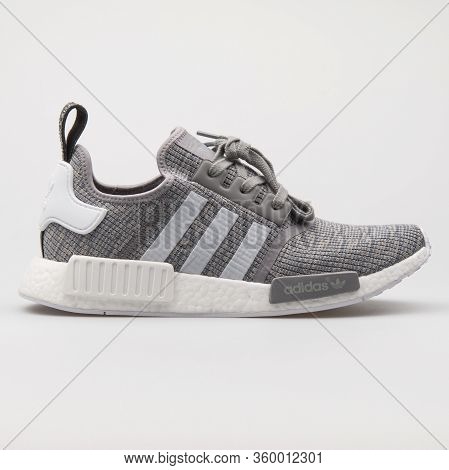 Vienna, Austria - August 14, 2017: Adidas Nmd R1 Grey Sneaker On White Background.