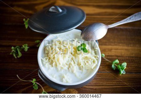 Sweet Boiled Vermicelli With Milk In A Ceramic Bowl