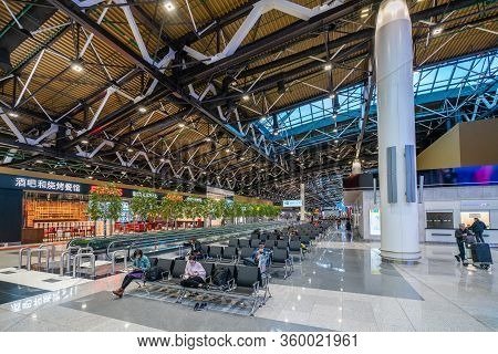 Moscow, Russia - 2020: Sheremetyevo International Airport, Terminal C. Passengers Sit On Armchairs I