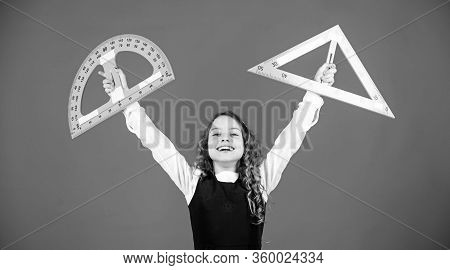 Theorems And Axioms. Smart And Clever Concept. Girl With Big Ruler. School Student Study Geometry. K