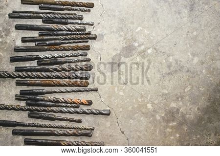 Drills On Concrete Of Different Diameter And Degree Of Novelty For A Perforator Lie On A Concrete Pl