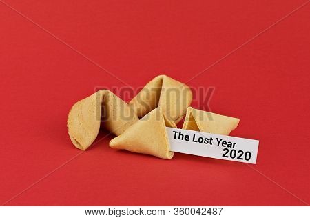 Traditional Chinese New Year Fortune Cookies On Red Background And Tag Wuth Text Lost Year 2020. Fal
