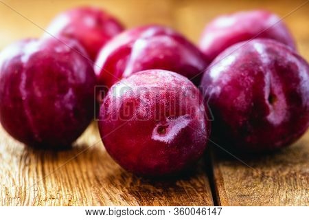 Brazilian Plum On Rustic Wooden Background, Image Of Tropical Fruit.