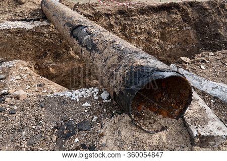 repair and replacement main pipeline of heating systems, district heating pipes network, water supply or Sewerage in city, removing old pipes and replacing them with new ones in a hole in the ground
