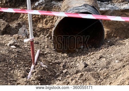 repair and replacement main pipeline of heating systems, district heating pipes network, water supply or Sewerage in city, removing old pipes and replacing them with new ones in a hole in the ground