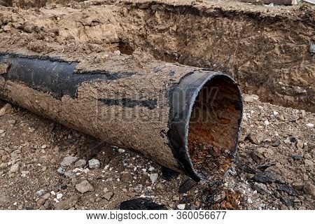 repair and replacement main pipeline of heating systems, district heating pipes network, water supply or Sewerage in city, removing old pipes and replacing them with new ones in a hole in the ground