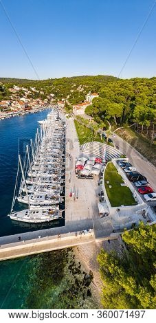 Croatia, Maslinica, 15 September 2019: Drone View Point On Moored In An Equal Row Sailboats At Sunse
