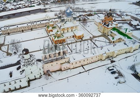 Above The Temples Of The Tikhvin Virgin Assumption Monastery On March Day (aerial Photography). Leni