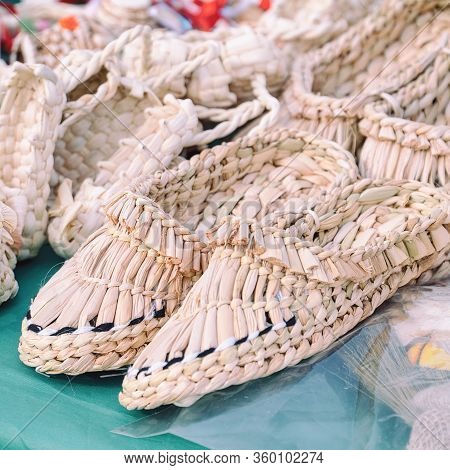 Souvenir Bast Shoes Woven From Bast. Old Traditional Russian Shoes