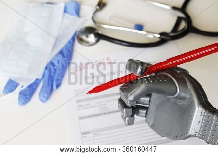 The Robot Writes Sars-sov-2. Coronavirus Test Concept. Robotic Medicine Concept. On The Table Are A 