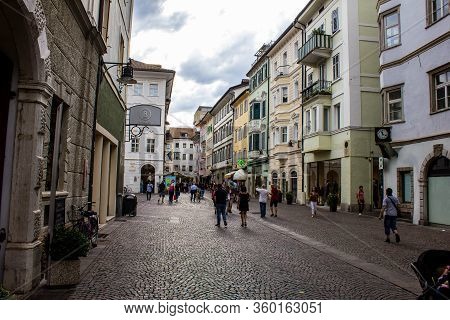 Bolzano, Italy - August 13, 2019: People Walking Along Via Della Mostra, Bolzano (bozen).