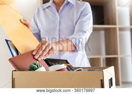Businesswoman Resigning From Her Job Hold Boxes And Packing Personal Company For Personal Belongings
