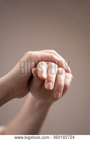 Treatment Of Hands With An Antiseptic Gel. Side View Of The Hands Rubbing In The Gel.