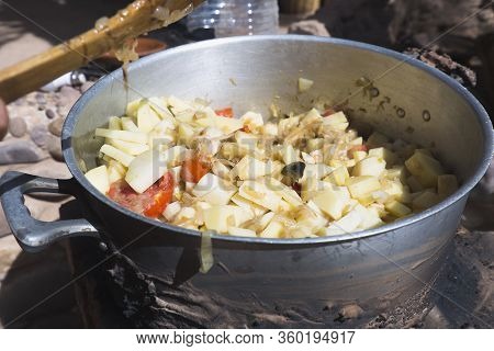 Food Preparation Cooks Firewood Made At M'hamid.