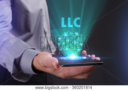 The Concept Of Business, Technology, The Internet And The Network. A Young Entrepreneur Working On A