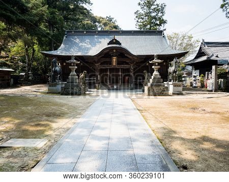 Tokushima, Japan - April 3, 2018: On The Grounds Of Awa Ichinomiya Shrine Opposite Dainichiji, Templ
