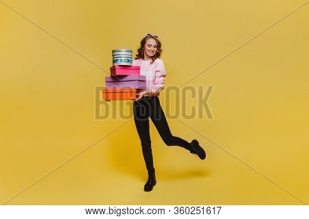 Beautiful Young Woman Holding An Big Gift Box. Attractive Elegant Young Woman Holding Gift Box Over 