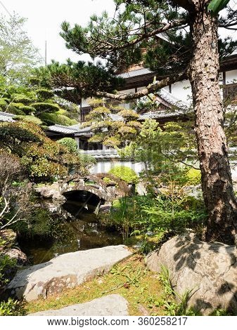 Sukumo, Japan - April 8, 2018: Traditional Japanese Garden With Pond On The Grounds Of Enkoji, Templ