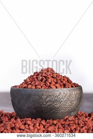 Achiote Organic Seeds In Wooden Bowl - Bixa Orellana