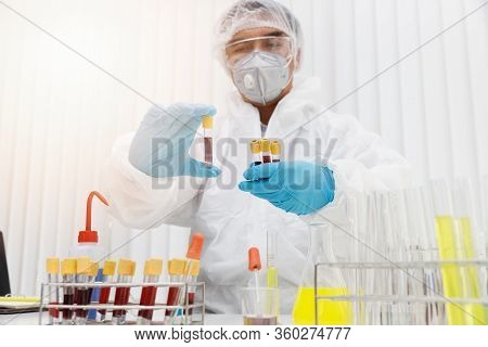 Research And Development Concept, Laboratory Scientist Researching Covid-19(corona Virus) Vacine At 