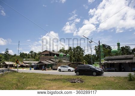 Narathiwat, Thailand - August 16 : Thai People And Foreign Muslim Drive Car And Ride Motorcycle Stop
