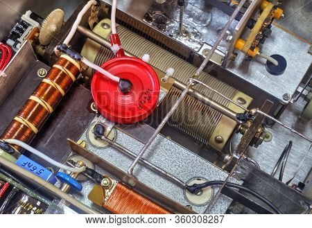 Inside View Of High Frequency Power Amplifier With Capacitors, Coils And Other Components