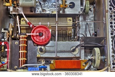 Inside View Of High Frequency Power Amplifier With Capacitors, Coils And Other Components